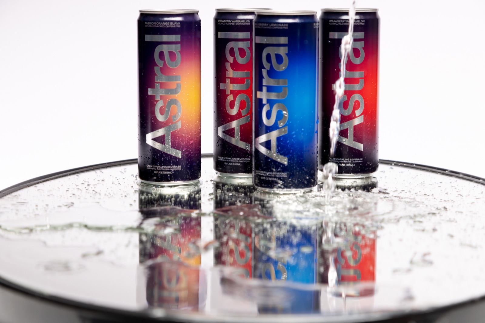Astral cans with a water splash, product photography
